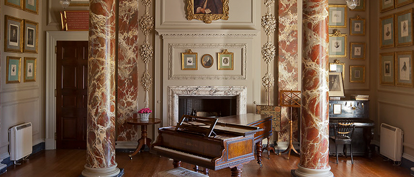 Historic pianos in a museum setting
