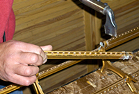 Tim Hendy Pianos workshop, removing a split Steinway action rail